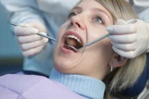 You can't hide your feelings! Women six times 'more disgusted by dental treatment' than men